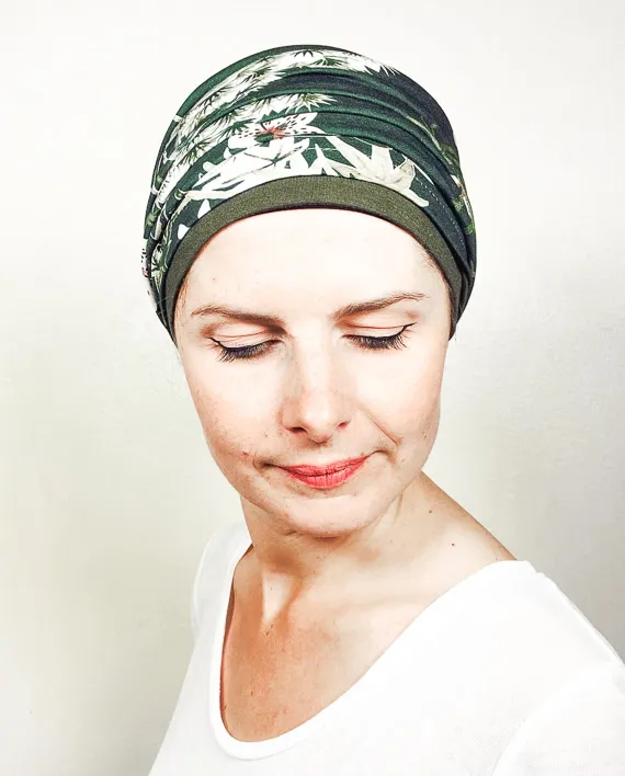 Green flowered headscarf and cap for chemotherapy and alopecia.