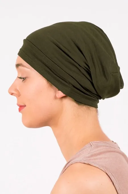 Green flowered headscarf and cap for chemotherapy and alopecia.