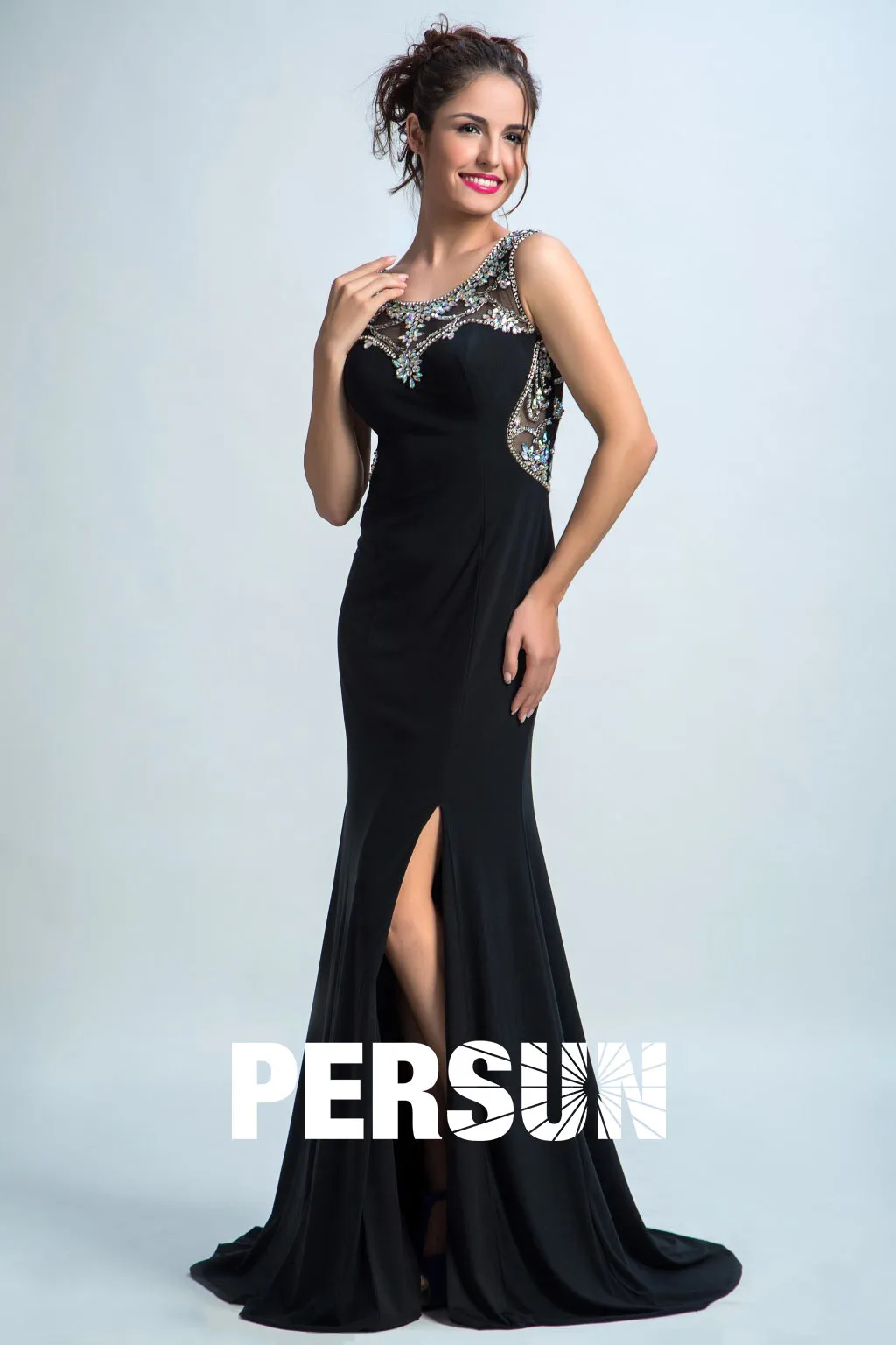 Black gala dress with round neckline, rhinestones, and side slit.