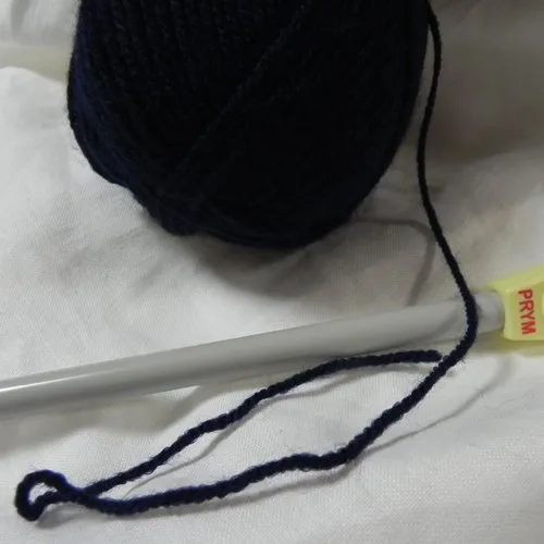 Black wool yarn 100% acrylic needles size 3