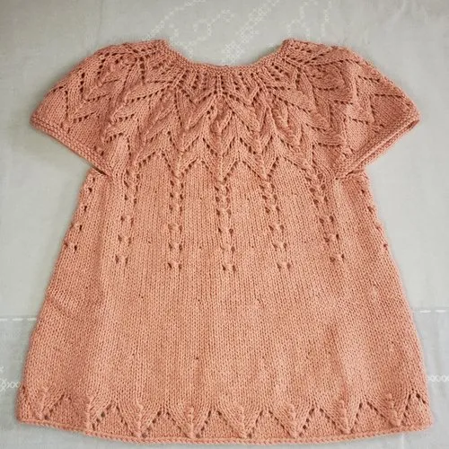 Hand-knit pink desert sand wool baby layette dress 0-3 months.