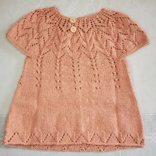 Hand-knit pink desert sand wool baby layette dress 0-3 months.