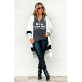 KEVA Boutique: Shop Elegant Cream Raven Vest and Sweaters