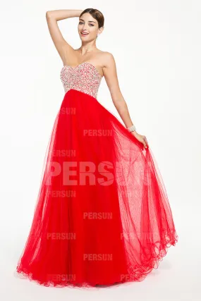 Red sequin bustier evening gown.