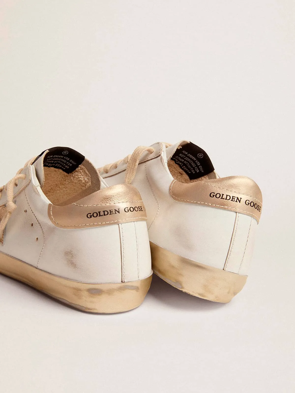 Women's Super-Star Sneakers with Golden Reinforcement Band | Golden Goose.