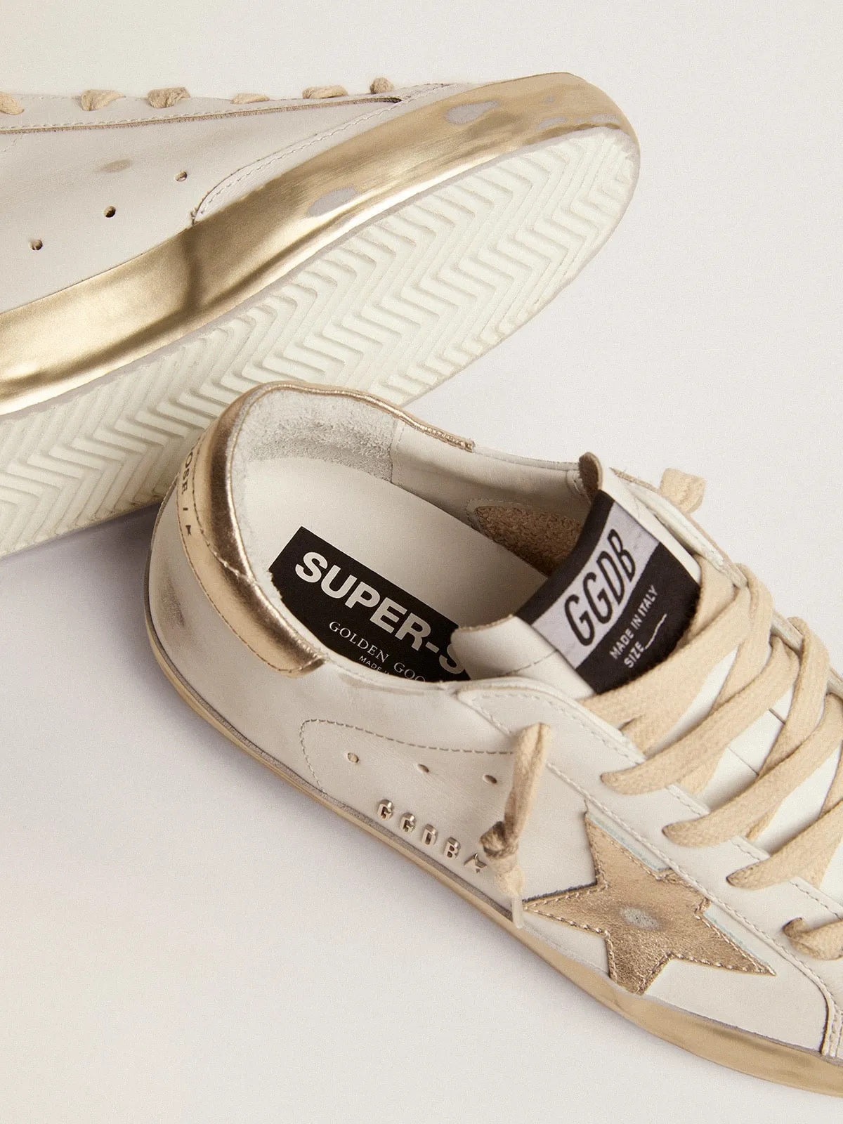 Women's Super-Star Sneakers with Golden Reinforcement Band | Golden Goose.